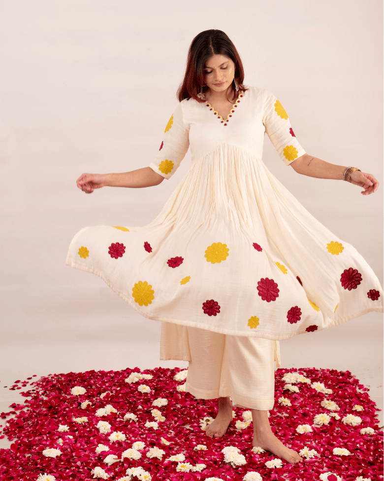 The pair of off white kurta with embroidered floral patchwork and